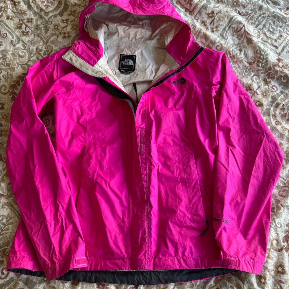 Bright pink north face rain coat